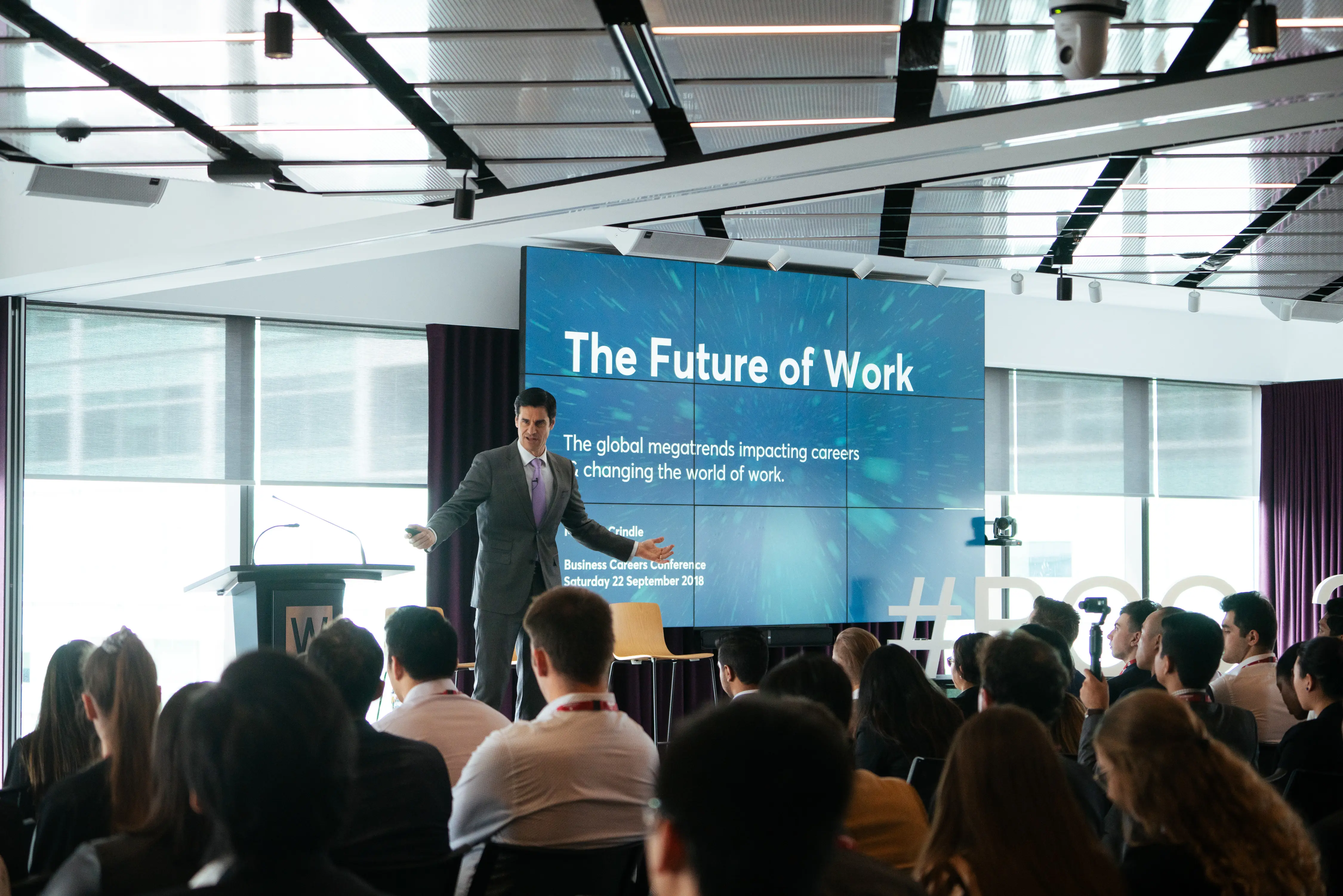 Mark McCrindle presenting his Future of Work keynote to a conference audience