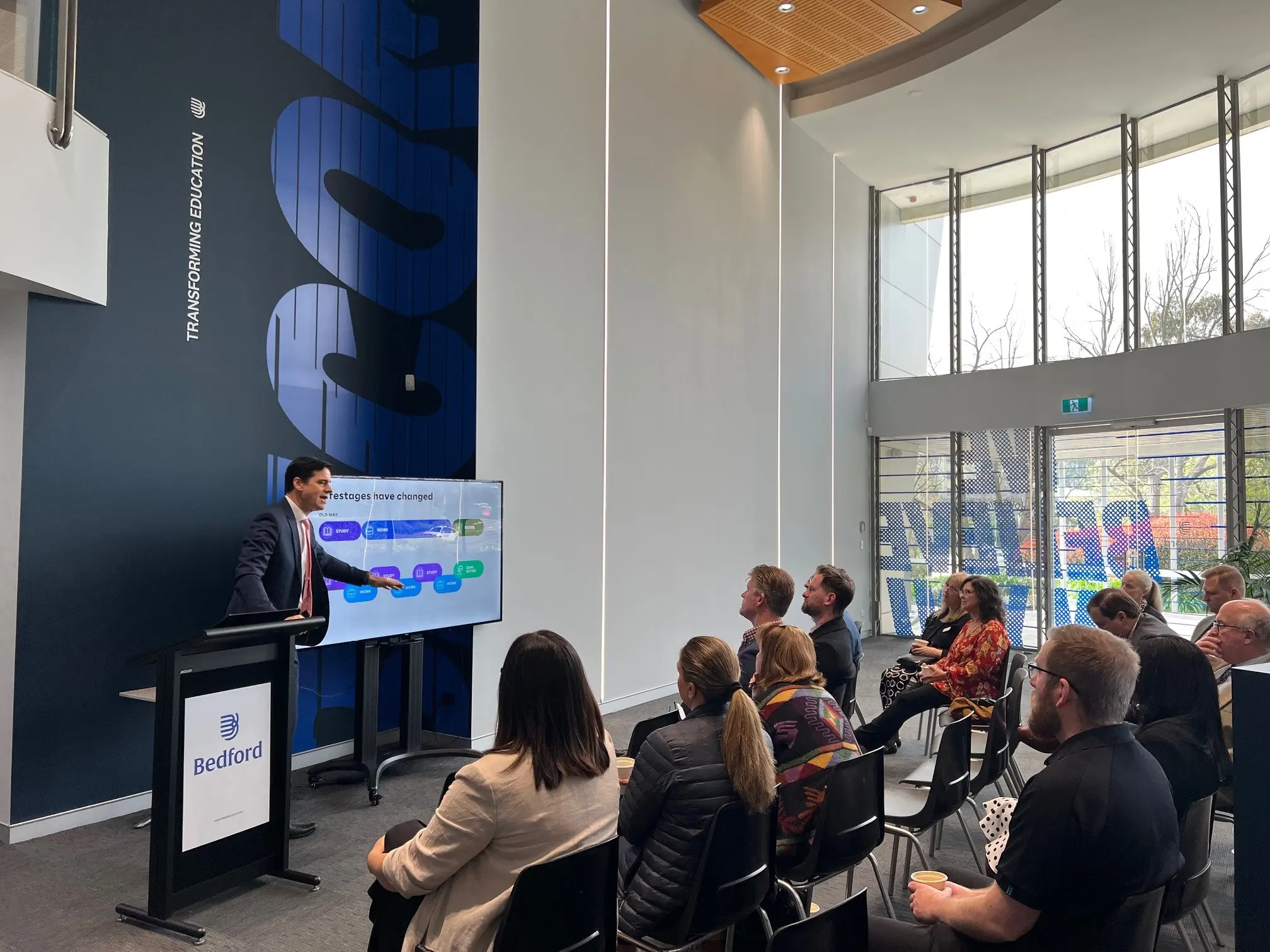 McCrindle researcher presenting trends to a group of leaders
